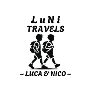 Logo for "LuNi Travels" featuring a black silhouette of two young boys walking side by side with backpacks.The boys appear adventurous, symbolizing travel and exploration. Above them, the text "LuNi Travels' is written in playful, bold font. Below the illustration, the words '~ Luca & Nico ~' are displayed, emphasizing the personal and family-centered nature of the brand. The design is minimalist, using a black and white color scheme for a clean and classic look.
