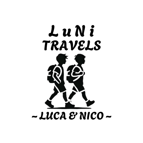 Logo for "LuNi Travels" featuring a black silhouette of two young boys walking side by side with backpacks.The boys appear adventurous, symbolizing travel and exploration. Above them, the text "LuNi Travels' is written in playful, bold font. Below the illustration, the words '~ Luca & Nico ~' are displayed, emphasizing the personal and family-centered nature of the brand. The design is minimalist, using a black and white color scheme for a clean and classic look.