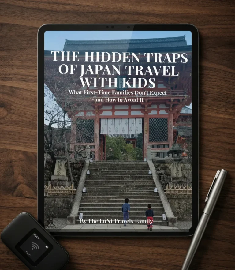 Cover of The Hidden Traps of Japan Travel with Kids showing two children walking toward a traditional Japanese temple, symbolizing common planning mistakes families face in Japan.