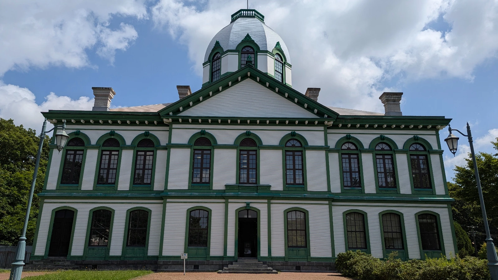 The green-domed government building at the Historical Village of Hokkaido showcasing Meiji-era Western architectural design.