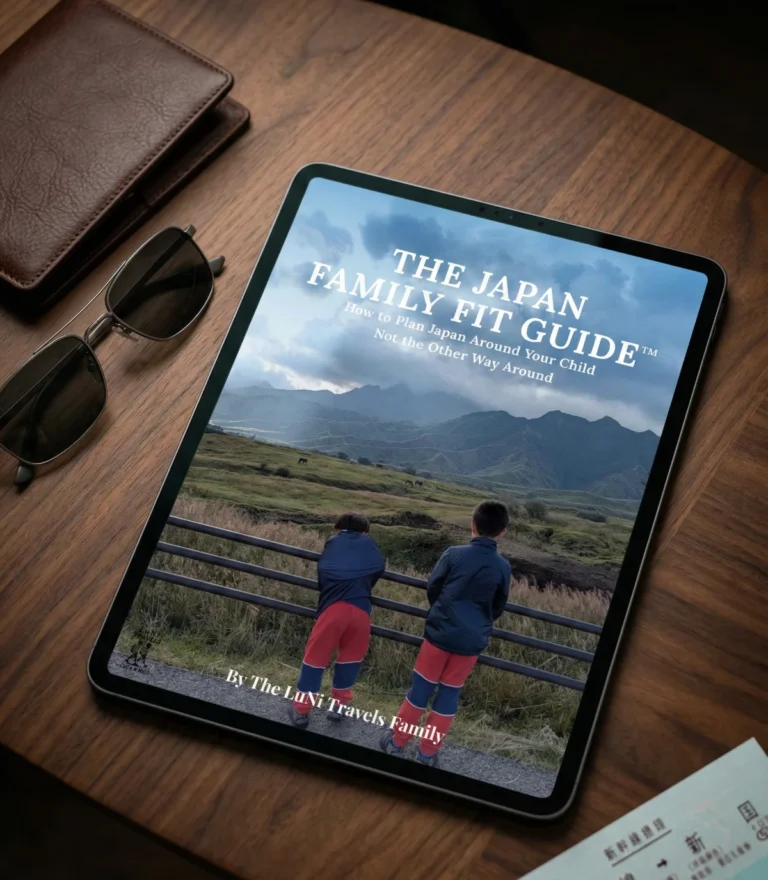 Cover of The Japan Family Fit Guide showing two children overlooking a peaceful mountain landscape in Japan, representing planning a family trip around a child’s needs.