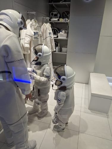 Young astronauts preparing for a space mission at KidZania Fukuoka, combining fun and education for kids interested in science and exploration.