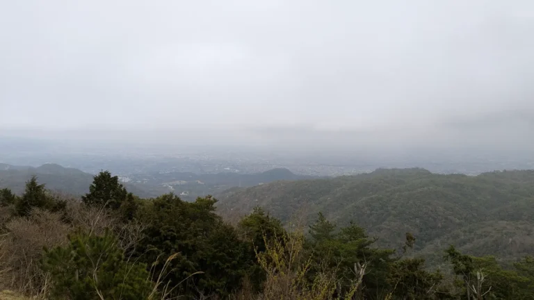 Panoramic view from Mount Rokko on a cloudy day, showcasing Kobe’s natural landscape, kobe family travel guide.