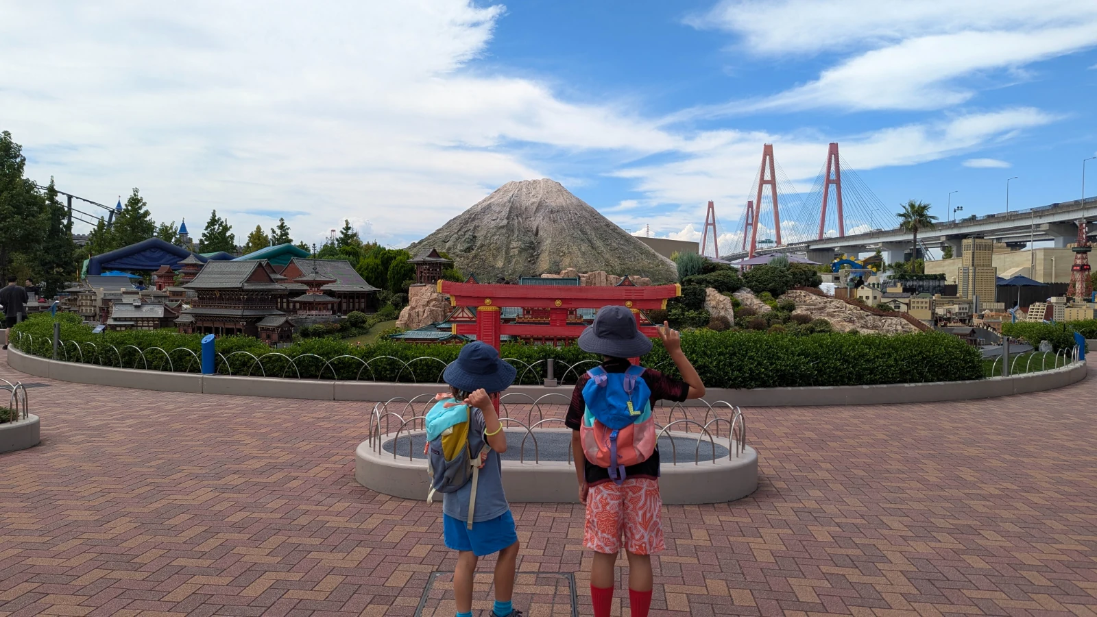 Luca and Nico face a brick Mount Fuji, a red torii and a bridge in Miniland at LEGOLAND Japan in Nagoya.
