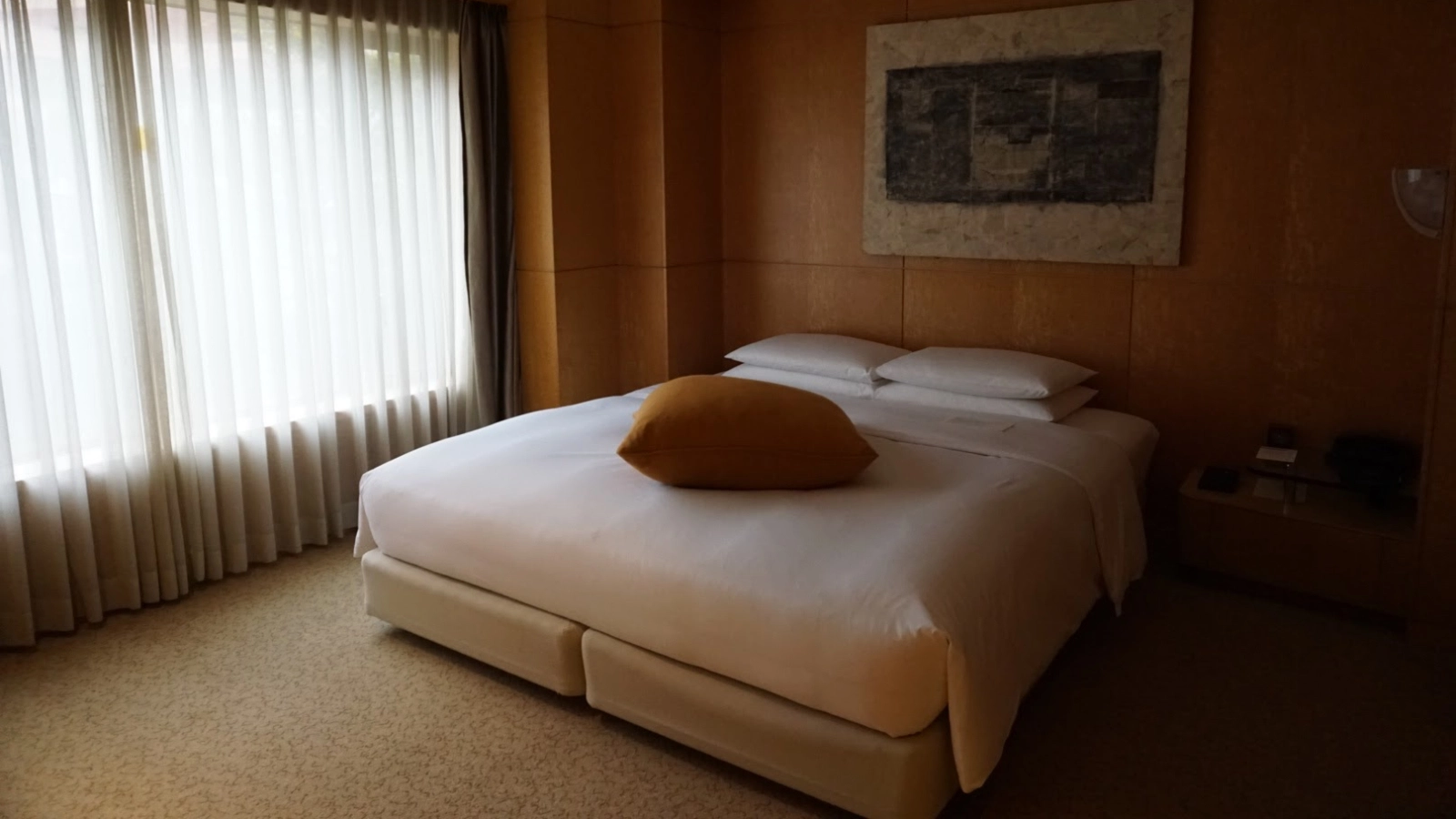 Elegant king room at a luxury family-friendly hotel in Fukuoka, Japan, featuring soft lighting, clean design, and peaceful decor, ideal for relaxing with kids after exploring the city.