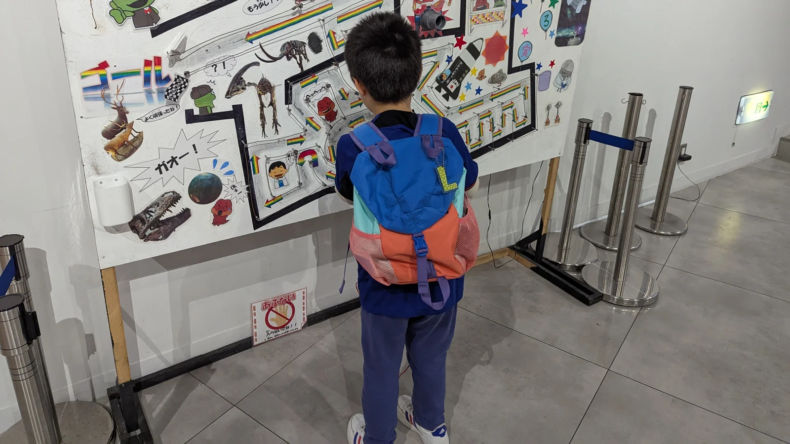 Luca exploring an interactive learning exhibit at the Nagasaki Science Museum in Nagasaki, Japan.