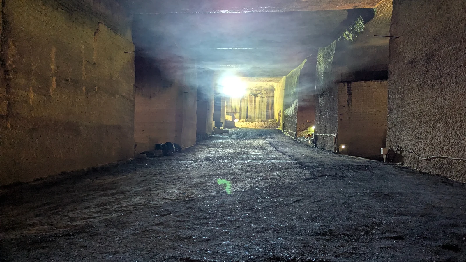 Massive stone walls and illuminated corridors inside the Oya History Museum underground quarry in Utsunomiya, Japan.