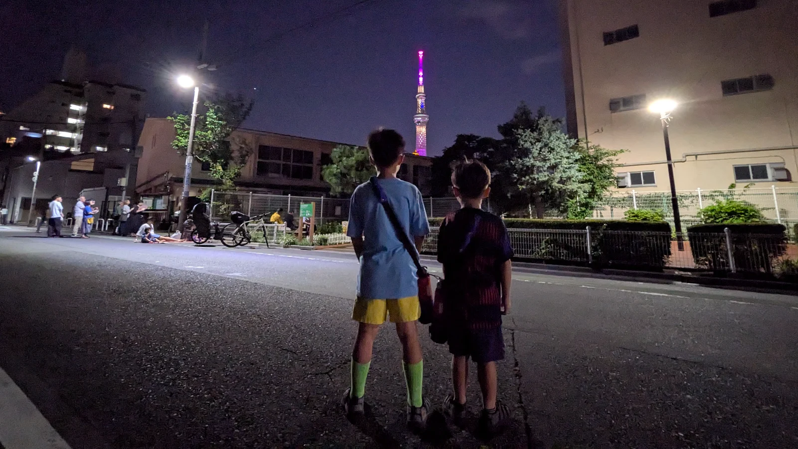 Tokyo Skytree observed from below, capturing the scale of Japan’s tallest tower and its appeal as a top attraction for families with kids.