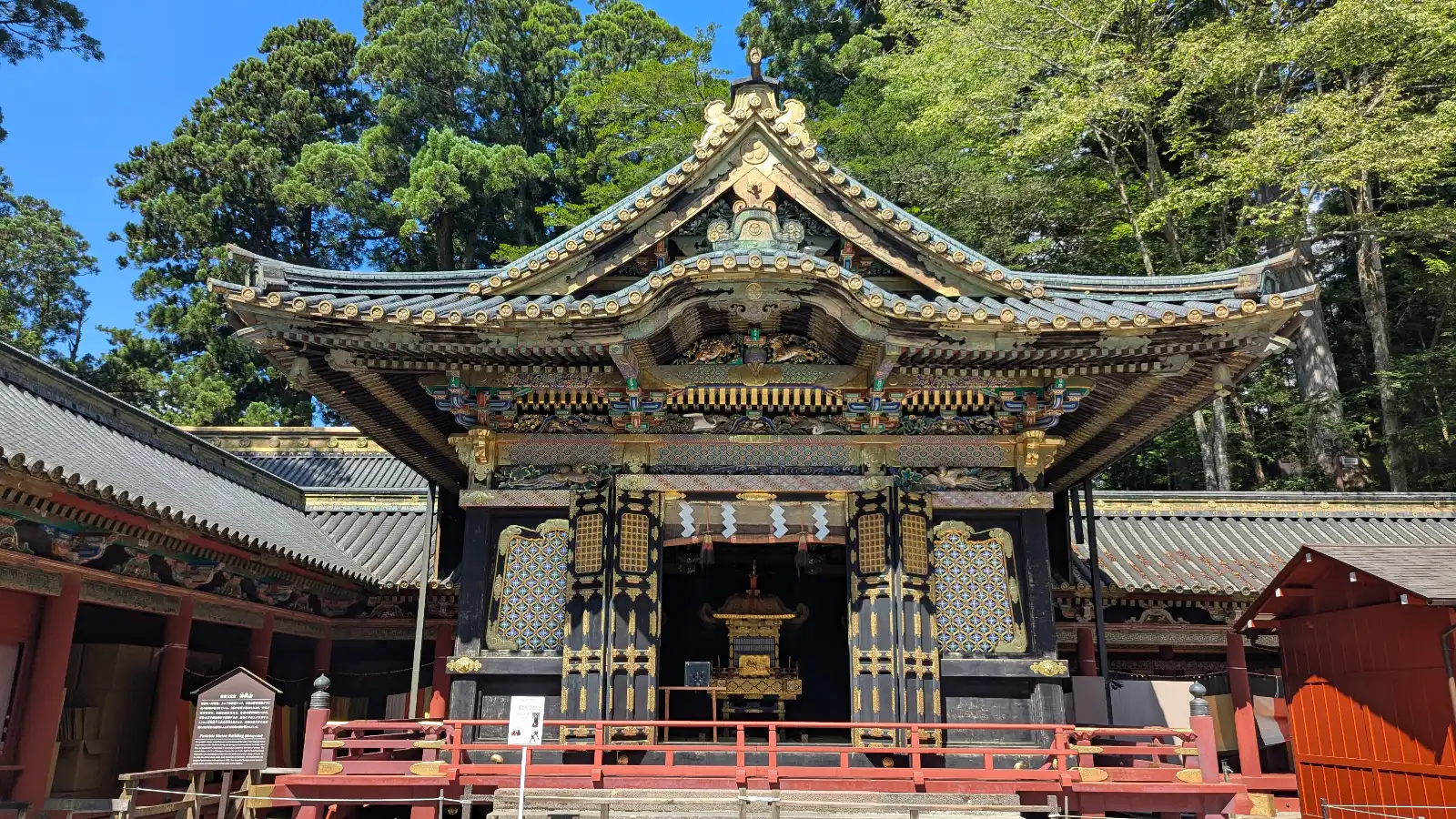 Yomeimon Gate at Toshogu Shrine in Nikko, showcasing intricate carvings and gold details on a sunny day, a popular family-friendly destination in Japan.