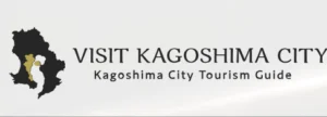 Visit Kagoshima City logo featuring a stylized black map of Kagoshima Prefecture with a golden highlight and white silhouette, next to black text reading "Kagoshima City Tourism Guide".